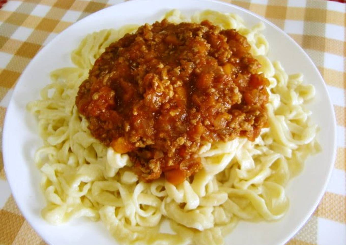Homemade fresh pasta with meat sauce