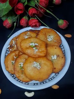 मीठे पुए (mithe puye recipe in Hindi) रेसिपी मुख्य फोटो