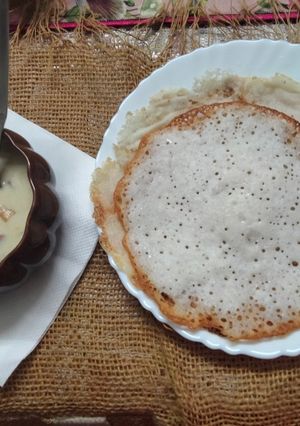 A picture of Kerala style Vegetable stew and Appam.