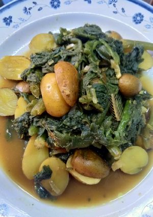 আলুর খোসা সহ মিষ্টি কুমড়ার ডোগা রেসিপির প্রধান ছবি