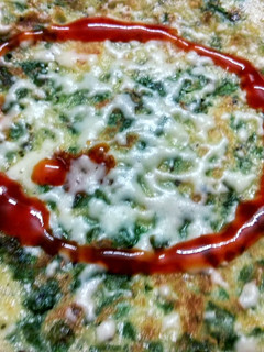 A picture of Cheesy spinach egg pancake.