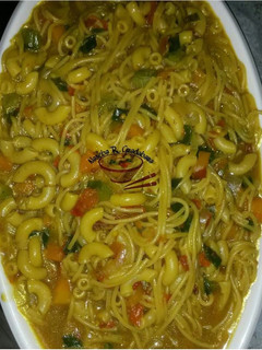 A picture of Pasta with macaroni jollof.