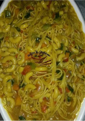 A picture of Pasta with macaroni jollof.