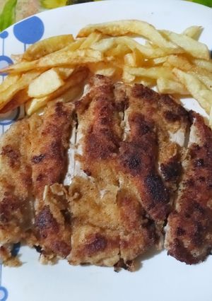 Une photo de Escalope de dinde pané aux frites