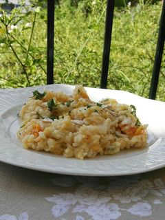 Una foto de Risotto de calabaza y queso de cabra con hierbabuena