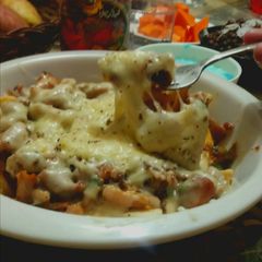 A picture of Chicken loaded fries.