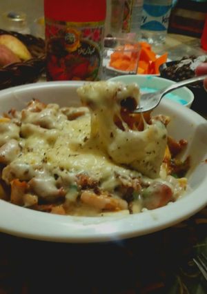 A picture of Chicken loaded fries.