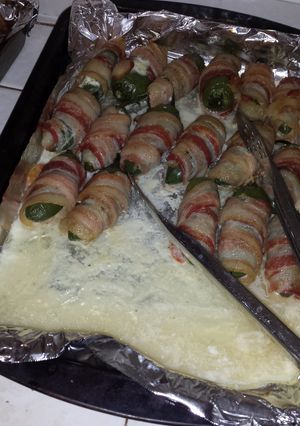 A picture of Bacon wrapped chicken stuffed jalapenos.