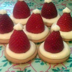 A picture of Vickys Vanilla Cookie Santa Hats GF DF EF SF NF.