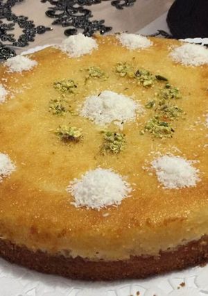 صورة لوصفة طريقة عمل بسبوسة جوز الهند محشية بالقشطة