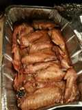 Deep fried Turkey wings smothered an covered in roasted garlic gravey.