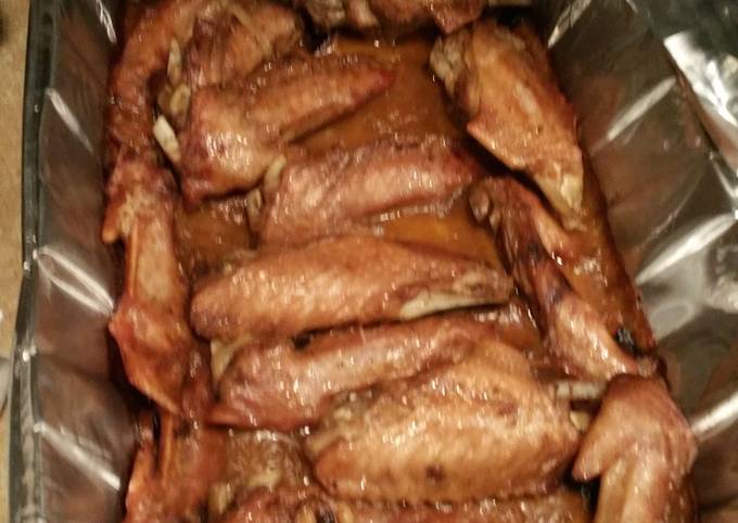 Deep fried Turkey wings smothered an covered in roasted garlic gravey.