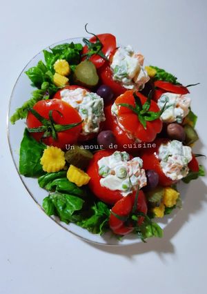 Une photo de Tomates farcies à la macédoine de légumes 🍅