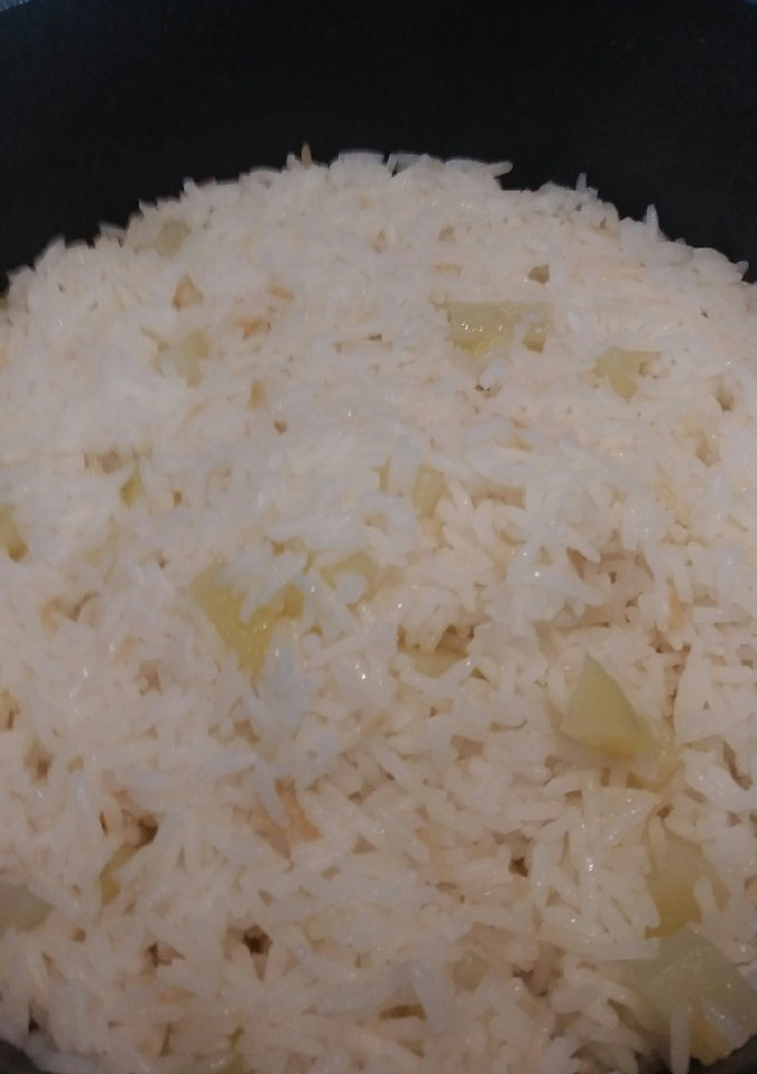 Una foto de Arroz blanco con papas