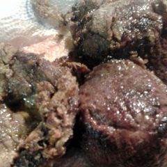 A picture of beef in a pan.