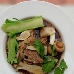 A picture of Herbal Pork Soup / Bak Kut Teh With Mix Mushroom And Brocoli.