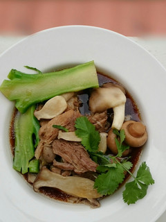 A picture of Herbal Pork Soup / Bak Kut Teh With Mix Mushroom And Brocoli.