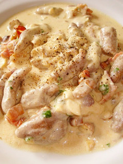 A picture of Cheese and Nuts Cream Sauce Pasta.