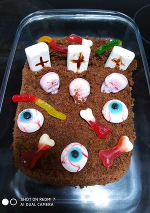 Una foto de Bizcocho de chocolate cementerio terrorífico de Halloween 😖