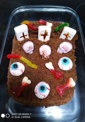 Una foto de Bizcocho de chocolate cementerio terrorífico de Halloween 😖