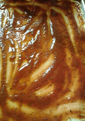 A picture of Dark pizza sauce.