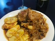 Una foto de bondiola de cerdo a la parrilla
