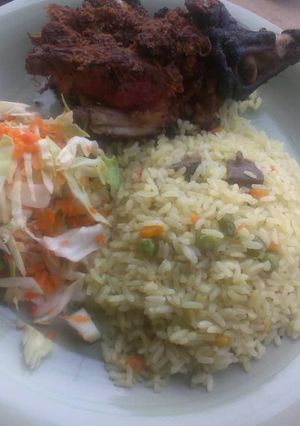A picture of Fried rice and roasted goat meat. #friedricecontest #abjmoms.