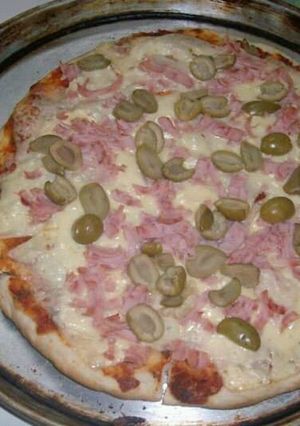 Una foto de Pizza casera al horno o parrilla