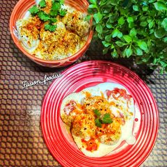 A picture of Moong daal dahi vade.