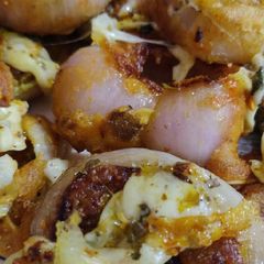 Stuffed Onion Rings loaded with cheese A picture of Stuffed Onion Rings loaded with cheese.