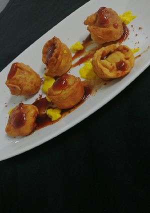 Una foto de Wantán de cerdo y pollo
