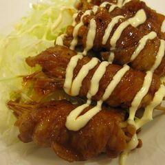A picture of Thinly Sliced Pork and Enoki Mushroom in Gochujang Sauce.