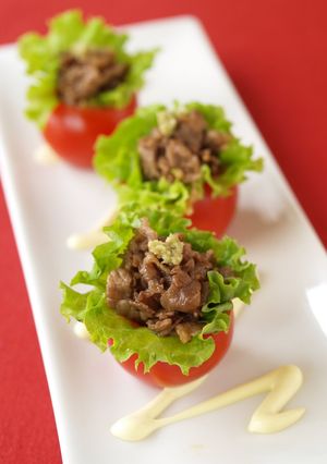 A picture of Easy and Elegant Bite-Sized Yakiniku Tomato Cups.