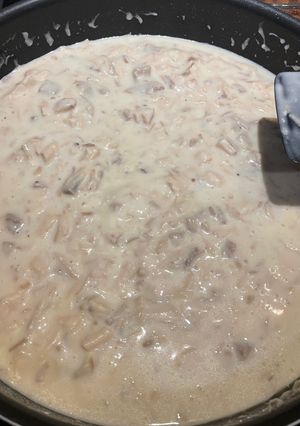 A picture of Creamed Turkey Gravy over biscuits.