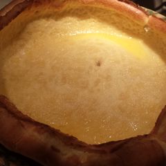 A picture of Puffy oven pancake / Dutch baby.
