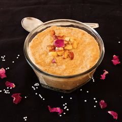 A picture of Caramel Payasam in pressure cooker.