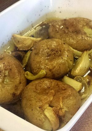 A picture of Squashed Potatoes in Olive Oil.