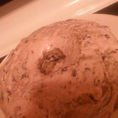 A picture of Blueberries Cake w/ Blueberries icing.