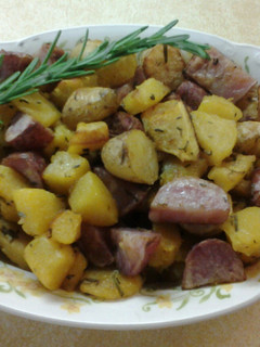 A picture of Roasted Rosemary Acorn Squash and Fingerling Potatoes.