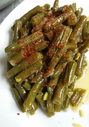 A picture of Green beans with olive oil.