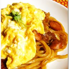 A picture of Stir Fried Udon Noodles with Melting Cheese and Fluffy Eggs.