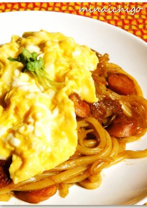 A picture of Stir Fried Udon Noodles with Melting Cheese and Fluffy Eggs.