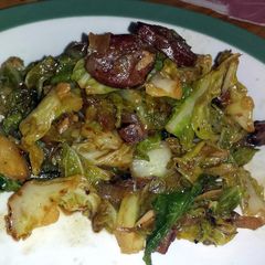 A picture of Fried chorizo and cabbage.