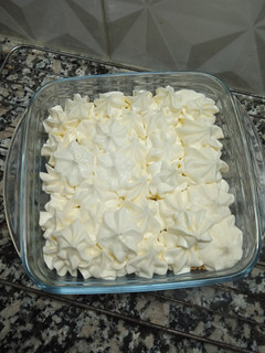 Una foto de Torta rallada.Cuadrados de dulce de leche