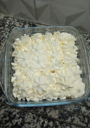 Una foto de Torta rallada.Cuadrados de dulce de leche