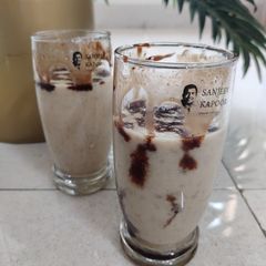 A picture of Apple dry fruits smoothie.