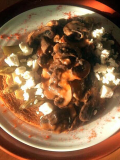 A picture of Sig's Green Asparagus and Creamy Garlic Mushroom Stack with Feta.