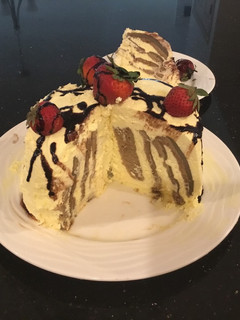 A picture of Vertical Chocolate Layer Cake with French Vanikka Cream Frosting.