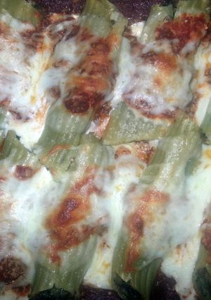 A picture of Italian sausage stuffed manicotti.