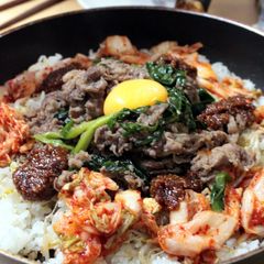 A picture of Stone-Cooked Style Bulgogi and Bibimbap.